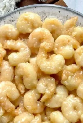 Plate of crispy Chinese Coconut Shrimp served with dipping sauce