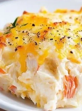 Delicious Crab Casserole served in a ceramic dish with crispy topping