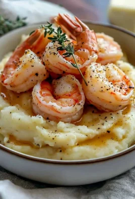 Creamy garlic shrimp served over a bed of fluffy mashed potatoes