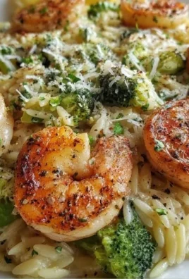Creamy orzo shrimp and broccoli dish served in a bowl