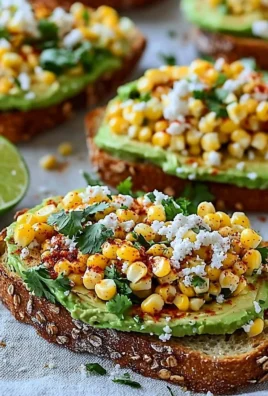 Mexican street corn avocado toast topped with fresh herbs and cheese