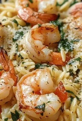 Delicious One Pan Parmesan Orzo with Shrimp served in a skillet