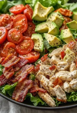 Savory BLT chicken salad with crispy bacon, lettuce, and tomatoes