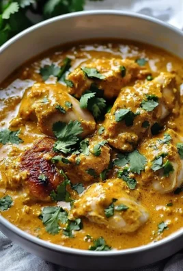 Slow cooker chicken korma served with rice and garnished with cilantro