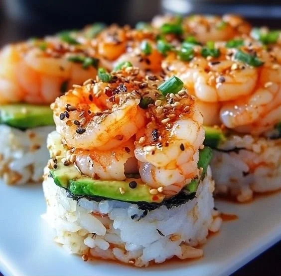 Spicy shrimp sushi stacks with vibrant toppings and fresh ingredients