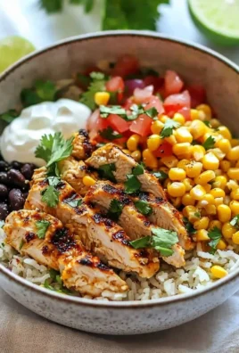 Delicious Street Corn Chicken Rice Bowl topped with fresh herbs and spices