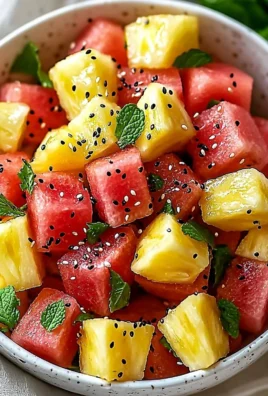 Refreshing Watermelon Pineapple Salad with mint and lime dressing