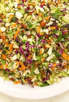 Colorful and fresh Crunchy Detox Salad with a variety of vegetables and toppings
