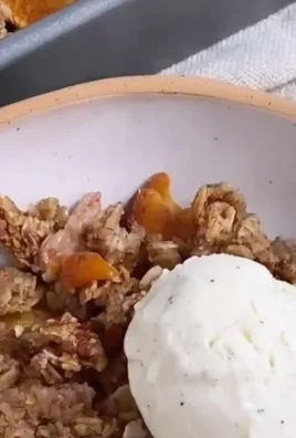 Delicious healthy peach crisp topped with oats and cinnamon
