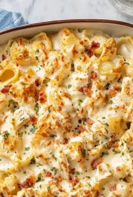 Delicious Crack Chicken Casserole topped with cheese and herbs