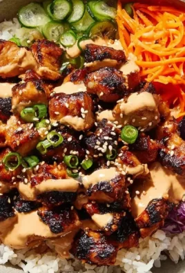 Delicious Korean BBQ chicken bowl with grilled chicken and colorful vegetables