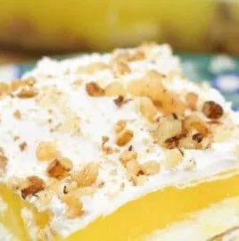 A delicious Lemon Delight dessert showcasing bright yellow lemon layers and garnishes.