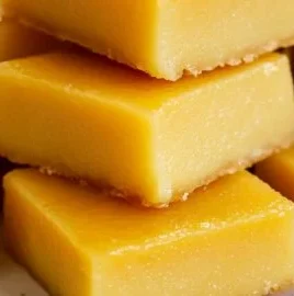 Mango Sticky Butter Mochi dessert featuring a rich, chewy texture and tropical flavor.