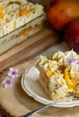 Delicious Mango Tiramisu dessert layered with mango and coffee flavor.