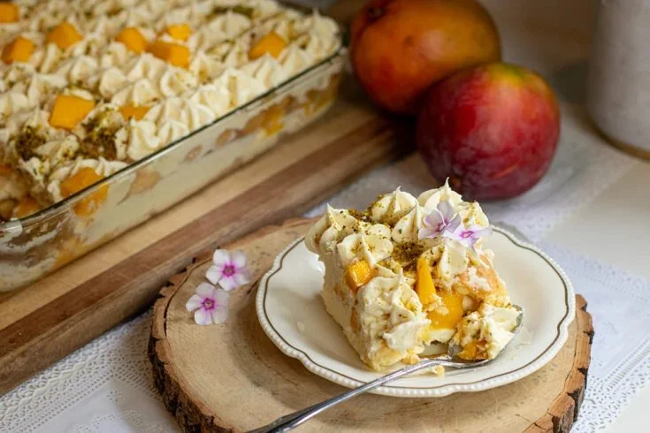 Delicious Mango Tiramisu dessert layered with mango and coffee flavor.