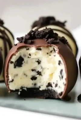 Delicious no-bake cookies and cream cheesecake balls on a platter