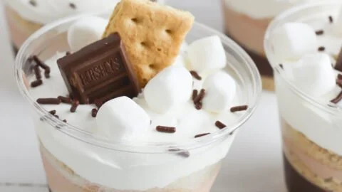 Delicious S'mores pudding parfaits with chocolate, marshmallows, and graham crackers.