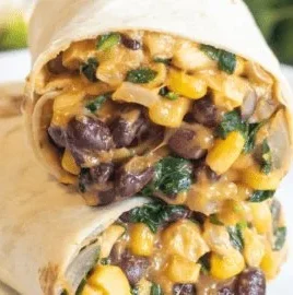15 minute black bean and spinach burritos served on a plate