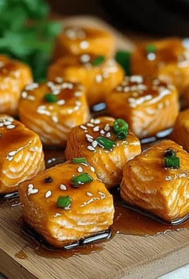 Delicious air fryer honey garlic salmon bites served on a plate