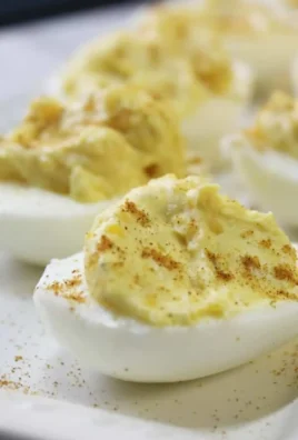 Delicious deviled eggs with cream cheese, a perfect party appetizer.