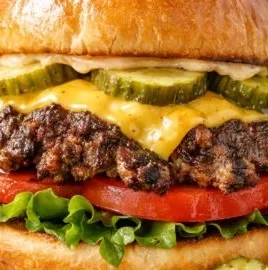 Deliciously cooked smashburger, crispy on the outside and juicy inside.