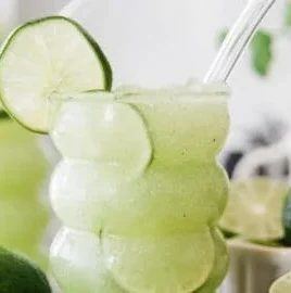 Refreshing Crazy Limeade Slush with vibrant green color and ice