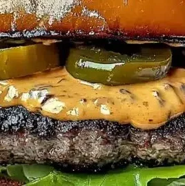 Creamy smash burger sauce with a tangy twist served on a delicious burger