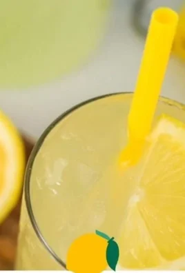 Glass of refreshing state fair lemonade with ice and lemon slices