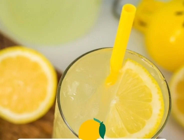Glass of refreshing state fair lemonade with ice and lemon slices
