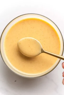 Delicious hot honey dipping sauce served in a small bowl