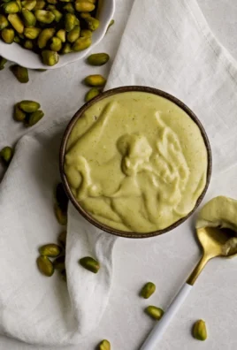 Delicious bowl of homemade Italian pistachio cream with nuts