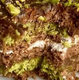 Delicious No Bake Dubai Chocolate Cake topped with chocolate shavings