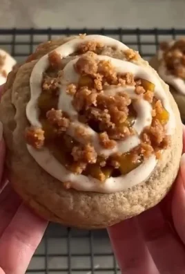 Freshly baked Peach Cobbler Cookies with a golden crust and peach filling.