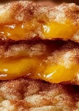 Freshly baked Peach Cobbler Cookies with peaches and crumbly topping