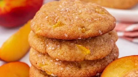 Freshly baked peach cookies on a cooling rack