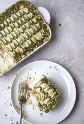 Delicious homemade Pistachio Tiramisu dessert with layers of cream and nuts