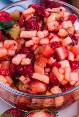Sweet fruit salad served with cinnamon sugar tortilla chips