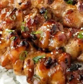 Grilled Teriyaki Chicken Skewers served on a platter with veggies