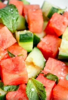 Refreshing watermelon cucumber salad with mint and lime dressing