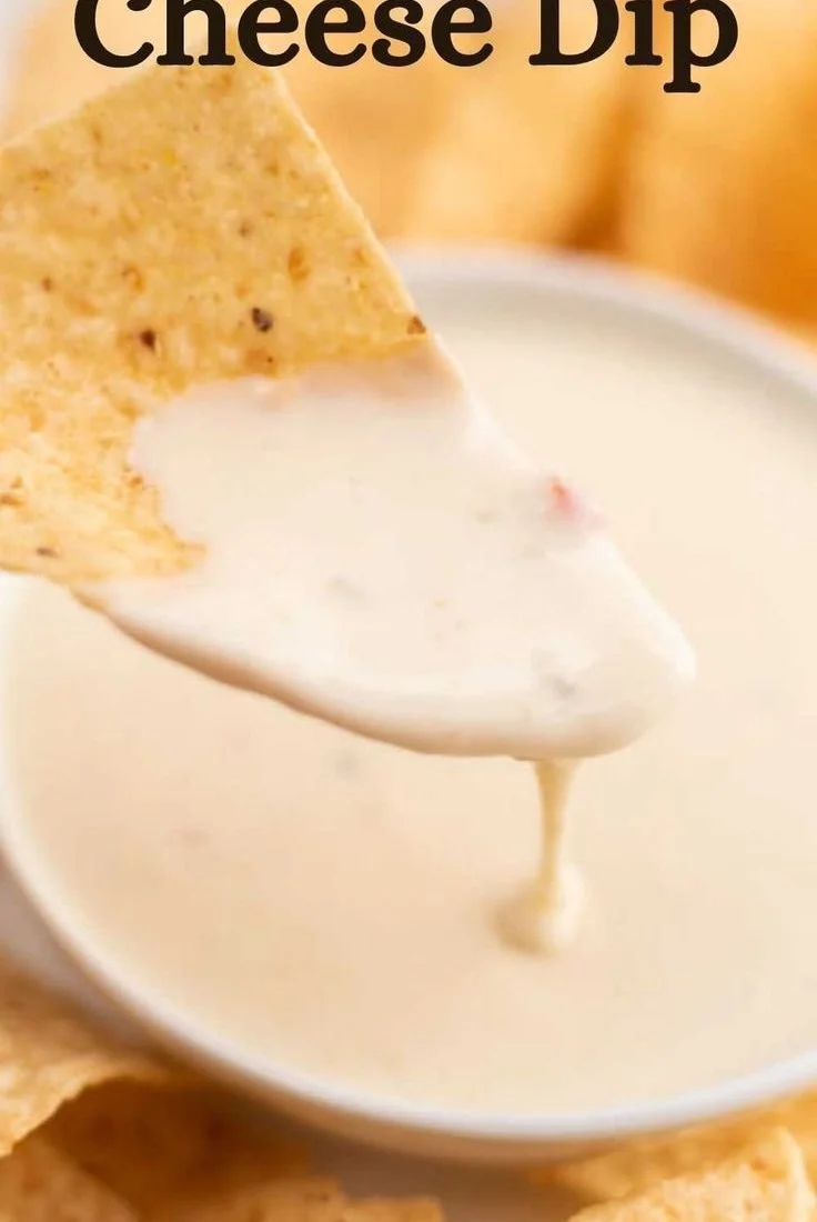Delicious bowl of homemade Mexican white cheese dip served with tortilla chips