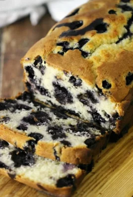 Deliciously baked blueberry muffin bread with fresh blueberries