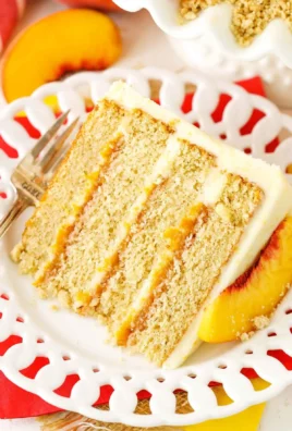Brown sugar layer cake with peach filling on a decorative plate