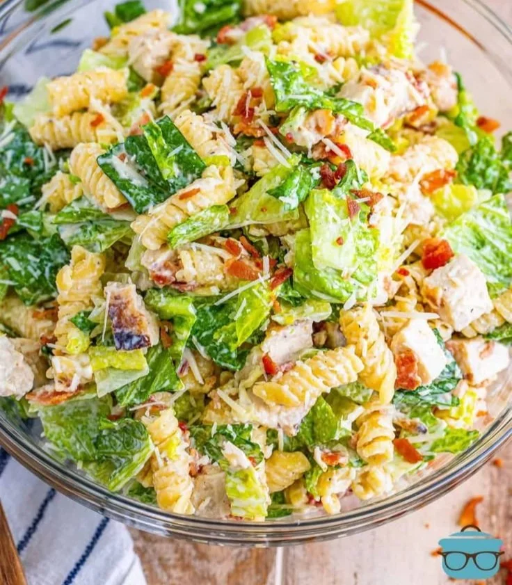 Healthy Chicken Caesar Pasta Salad with grilled chicken, romaine, and Caesar dressing.