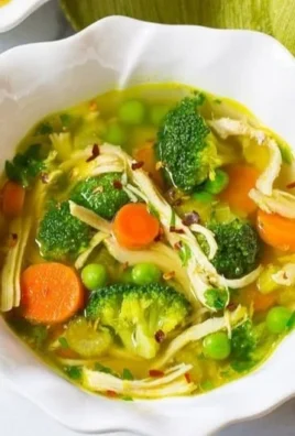 Delicious Chicken Detox Soup in a bowl, packed with healthy ingredients.