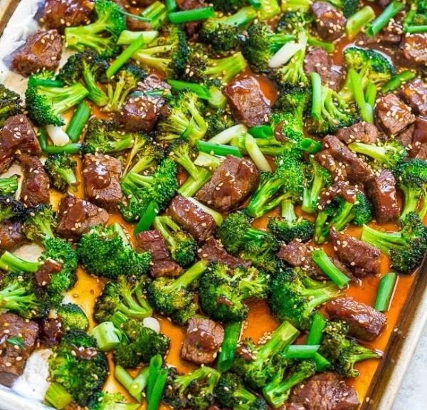 Delicious plate of Chinese beef and broccoli stir-fry served with rice
