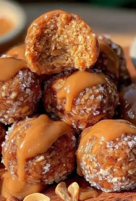 No-bake peanut butter oat energy balls on a wooden plate