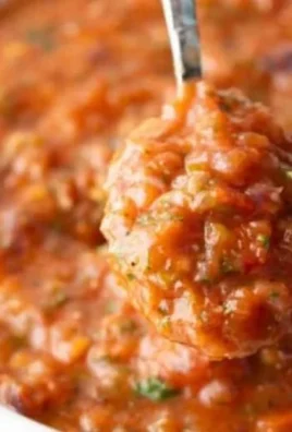 Bowl of easy roasted salsa with fresh ingredients and bright colors