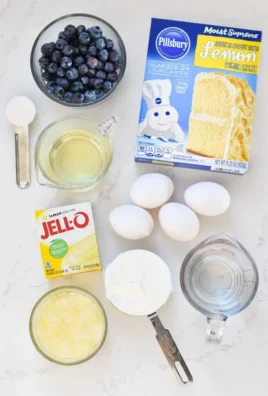 Lemon Blueberry Bundt Cake with fresh berries on a white plate