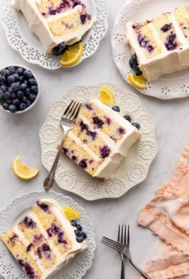 Delicious Lemon Blueberry Layer Cake with fresh blueberries and lemon zest