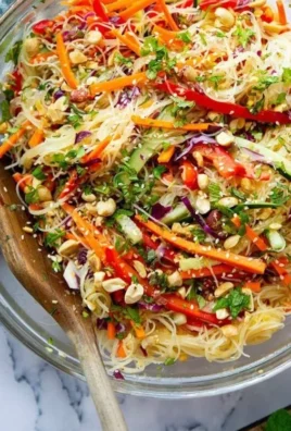 Colorful Loaded Spring Roll Salad with fresh vegetables and herbs
